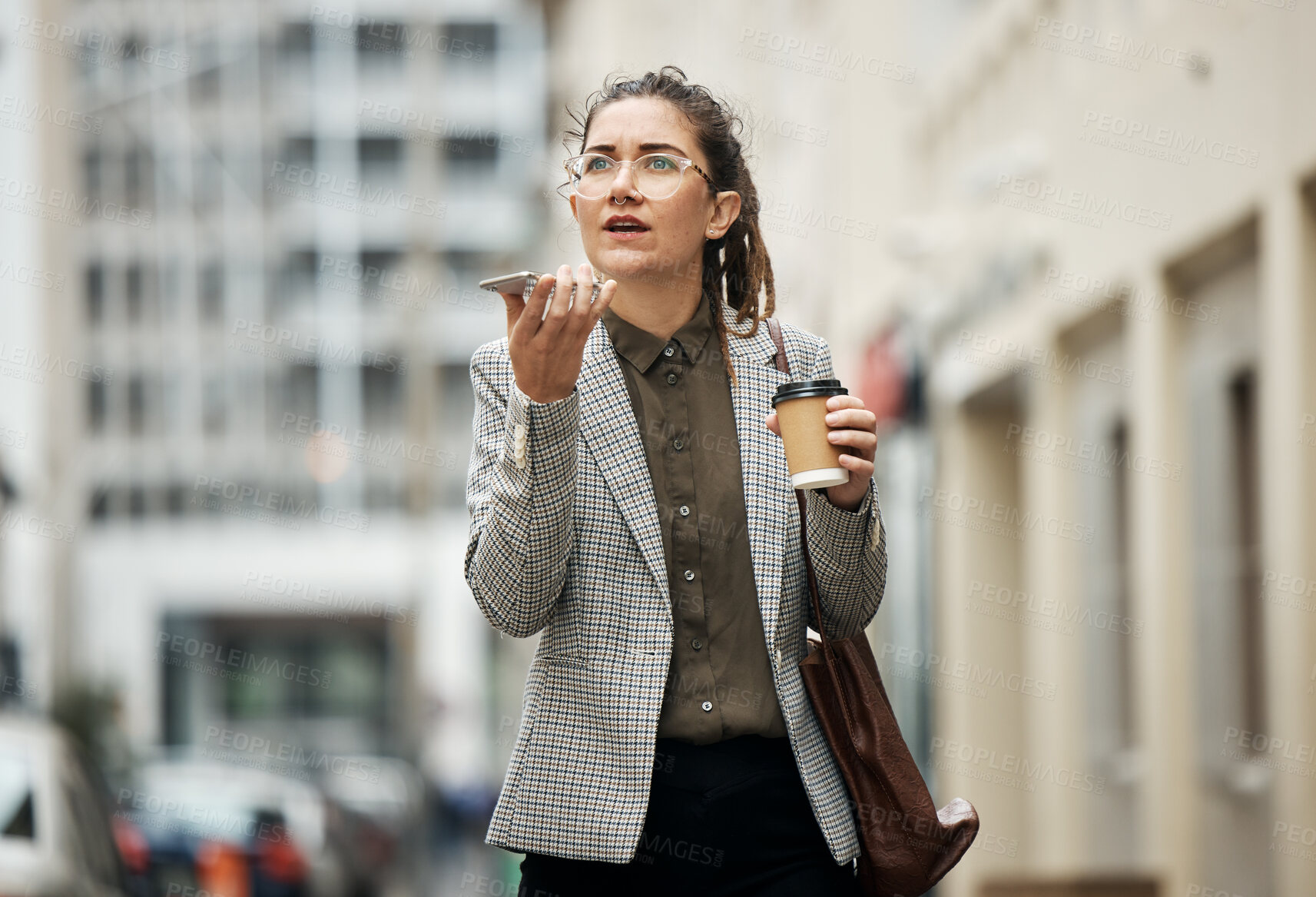 Buy stock photo Speaker phone call, city and professional woman walking, speaking and planning in discussion, conversation or communication. Voice note, coffee break and outdoor person chat on morning consultation