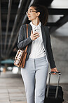 Phone, vision and suitcase with a business woman walking in an airport parking lot outdoor in the city. Mobile, luggage and thinking with a young female employee on an international trip for work