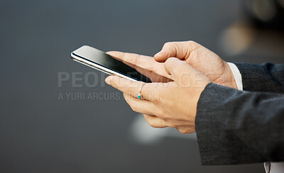 Buy stock photo Phone, hands and woman texting in a city street for travel, location and internet, search or tracking closeup. Hand holding, smartphone and female checking social media, app or email on town commute
