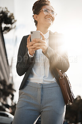 Buy stock photo Employee, city and woman with a smartphone, smile and email with internet connection, social media and lens flare. Worker, travel or business person with a cellphone, mobile app or sms with happiness