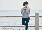 Happy, phone and fitness with black woman at beach for running, workout and mockup. Network, communication and contact with female runner training in nature for technology, sports and mobile