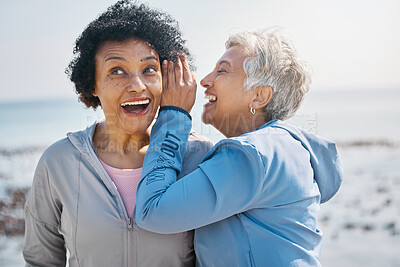 Buy stock photo Gossip, beach and senior friends with a secret, whisper or talking in ear for a funny joke after outdoor exercise. Laughing, crazy and elderly women listening to conversation or story at the sea
