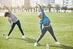 Women, elderly and stretching in park, exercise and wellness with flexibility and start workout outdoor. Female people, friends with pilates or running in nature, training and fitness with vitality