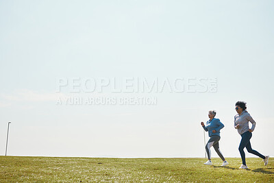 Buy stock photo Women are running, fitness and cardio outdoor with training for marathon with mockup space. Female runner team in park, exercise and triathlon race with sports and athlete, health and wellness