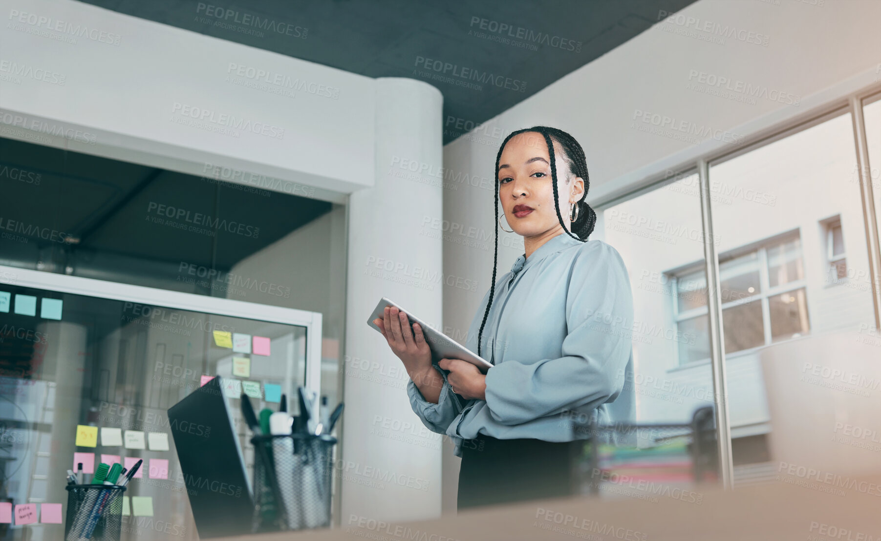 Buy stock photo Low angle portrait of woman in office on tablet, research and sticky note ideas on moodboard for business plan. Internet, confidence and businesswoman on digital app for online review at startup.