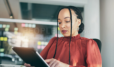 Buy stock photo Tablet, planning and a business black woman in her office, working online while reading a schedule or calendar. Technology, research and innovation with a corporate employee reading internet data