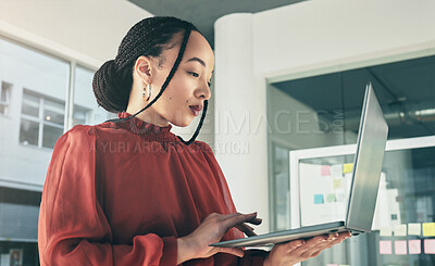 Buy stock photo Woman standing in office with laptop, research and ideas on website for business plan, brainstorming or proposal process. Thinking, typing and businesswoman on computer with online review at startup.