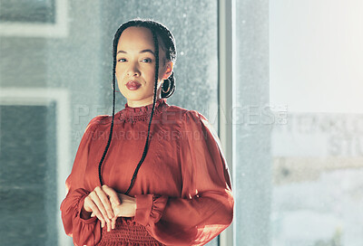 Buy stock photo Serious, corporate and portrait of a woman at work for business, professional job or career. Office, young and an employee or worker at a company, agency or workplace by a window and working