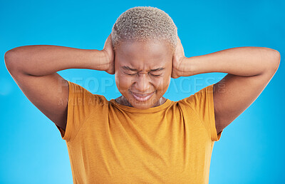 Buy stock photo Stress, headache or black woman cover ears in studio on blue background with noise crisis or anxiety. Conflict, scared person or African girl with fear of trauma, head pain or sound distraction 