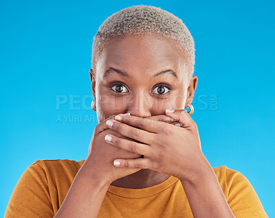 Gossip, secret or portrait black woman shocked by mistake or announcement in studio on blue background. Wow, fake news or surprised girl with excited, wtf or omg expression with hands to cover mouth