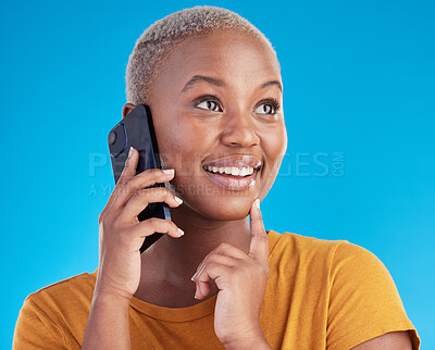 Buy stock photo Black woman, phone call and thinking of university decision, listening to news and feedback on a blue, studio background. Happy person or student on mobile communication with ideas or future planning