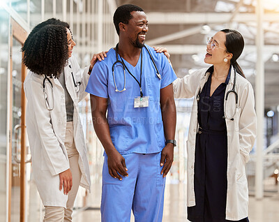 Buy stock photo Doctors, hospital and healthcare team laughing together with teamwork, motivation and collaboration. Diversity, happy and professional man and women with support, funny joke and career in medicine