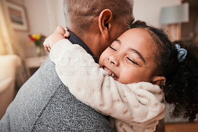 Buy stock photo Father, child and hug in home living room for love, care and bonding together. Dad, girl and embrace in lounge for trust, support and quality family time to relax, smile and happy kid in house