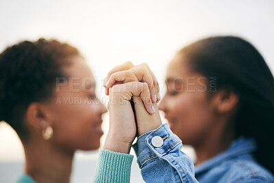 Buy stock photo Holding hands, lgbtq and queer couple with love, outdoor and romance with support, marriage and quality time. Lesbian, fingers and women with holiday, romantic and loving together with equality