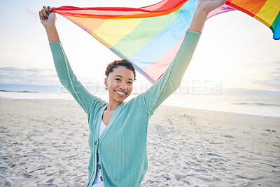 Buy stock photo Woman, beach and pride flag for lgbtq in portrait, smile and wind with wave, rainbow and equality for inclusion. African girl, fabric or cloth for human rights, lesbian sexuality or happy on vacation
