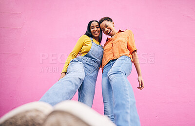 Buy stock photo Selfie, fashion and portrait of friends on pink background in city with trendy clothes, stylish and cool outfit. Happy, creative and below of female people for freedom on holiday, vacation or weekend