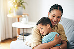 Love, home mom and happy kid hug parent for support, care and connect in Brazil apartment. Smile, happiness and family mama, child or people enjoy quality time together, embrace or relax in lounge
