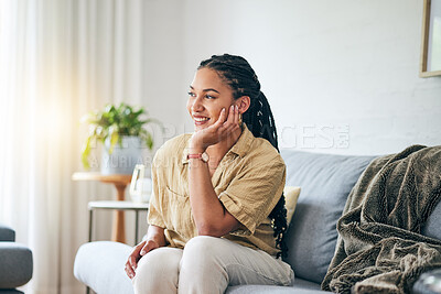 Buy stock photo Happy, African woman and thinking in home about interior design, decoration or idea in apartment, living room or house. Girl, relax and lounge on sofa with inspiration, goals or peace in life 