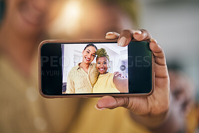 Buy stock photo Lesbian couple, women and selfie with phone screen in home in portrait, post and web blog in living room. African girl, photography and memory with profile picture, lgbtq or social media app in house