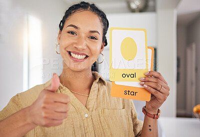 Buy stock photo Happy woman, portrait and thumbs up with shape cards for education, success or good job at home. Face of female person or teacher smile with like emoji, yes sign or OK for visual learning approval