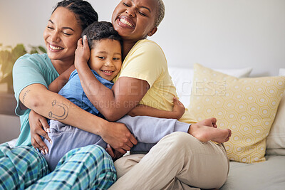 Buy stock photo LGBT, bedroom hug and happy family, child and relax mothers bonding, support and enjoy quality time together. Home, care and gay people, homosexual parents or lesbian women embrace young kid on bed