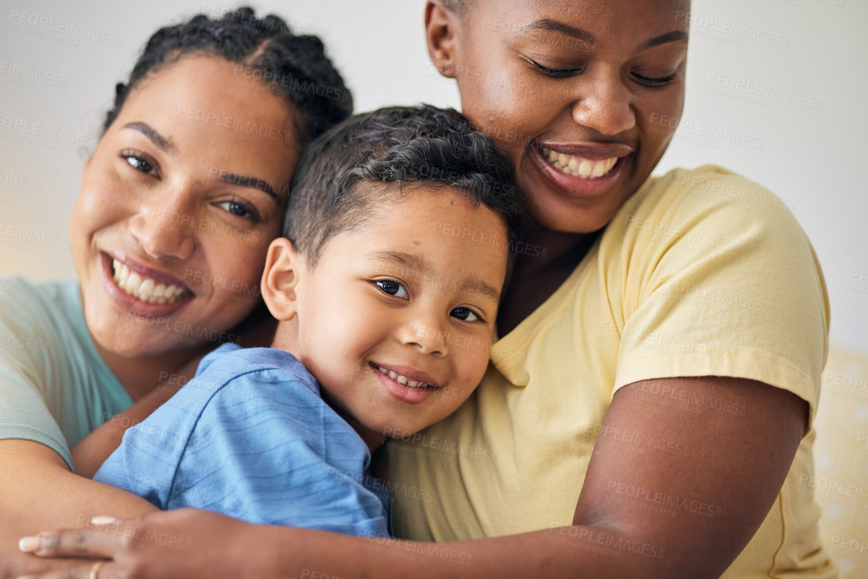Buy stock photo LGBT, hug and face of family portrait, happy kid and mothers love, affection and enjoy bonding time together. Home, closeup and gay people, non binary parents or lesbian women embrace adoption child