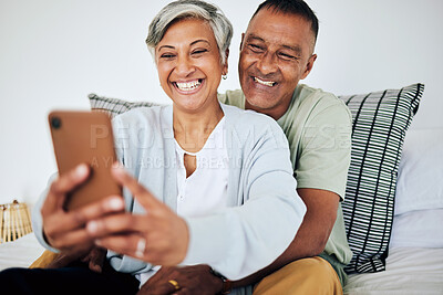 Buy stock photo Mature, happy couple and selfie in bed at home with smile, retirement and marriage. House, mobile and social media for profile picture in bedroom with online and photo on web with senior people