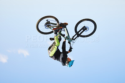 Buy stock photo Bike, man and upside down in sky for action, bicycle stunt and challenge on mockup space. Biker, sports athlete and courage for air jump, energy and freedom of risk in cycling contest, race and show