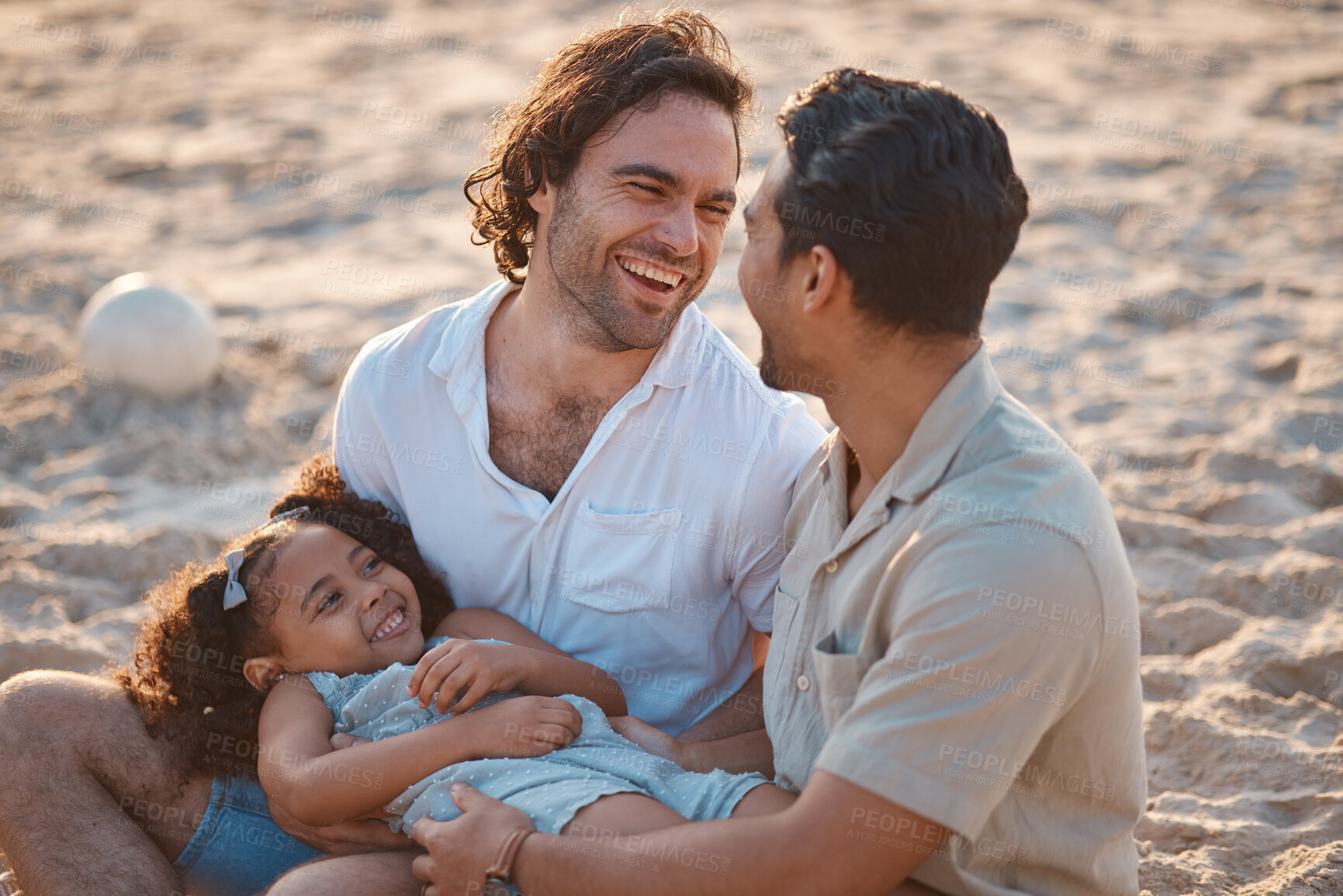 Buy stock photo Gay couple, relax and laughing with family at beach for seaside holiday, support and travel. Summer, vacation and love with men and child in nature for lgbtq, happiness and bonding together