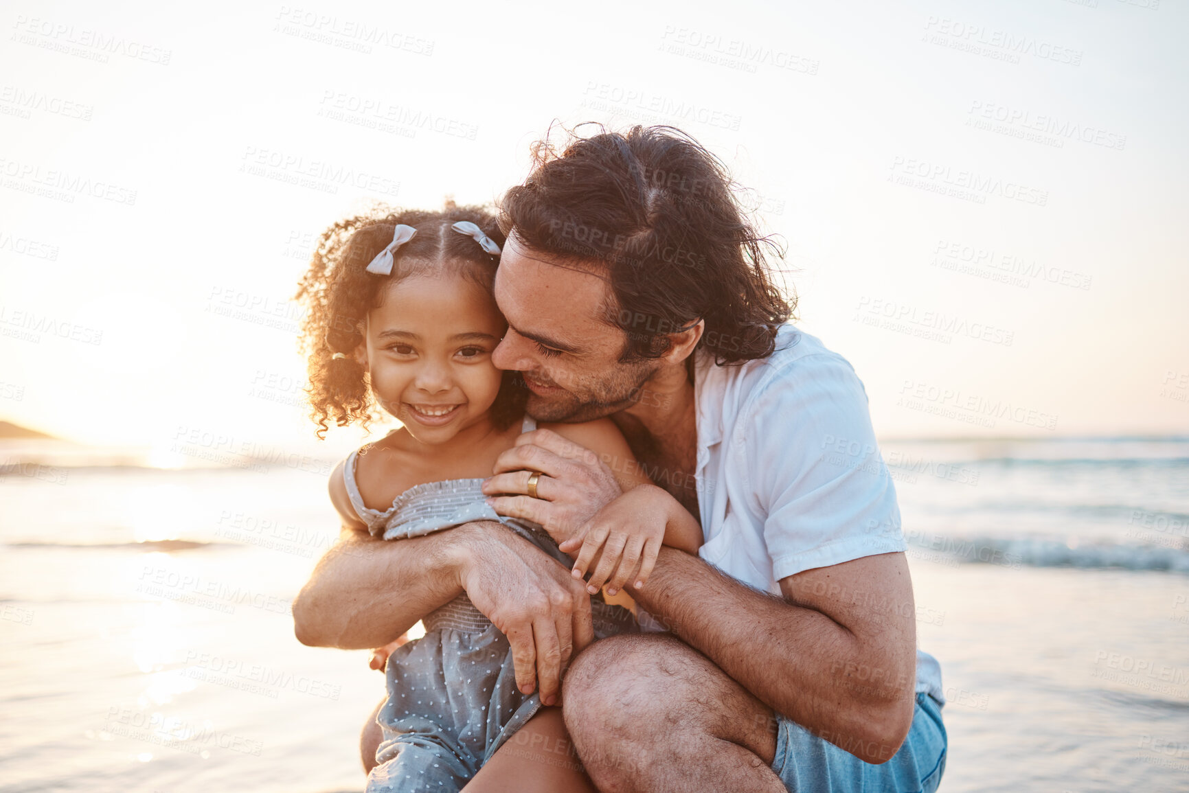 Buy stock photo Hug, portrait and a child and father at the beach for holiday, care and love together after adoption. Happy, family and an interracial dad with a girl kid at the ocean for playing, travel or vacation