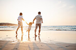 Love, gay couple and men with child on beach, holding hands and island holiday together. Trust, happiness and sun, lgbt family on tropical ocean vacation with daughter in playing in waves with nature