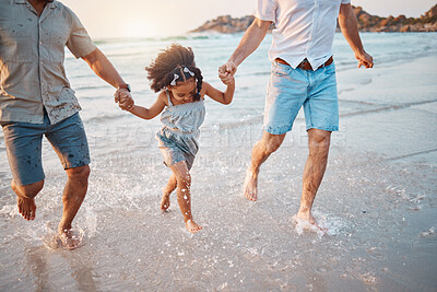 Buy stock photo Beach, running and parents holding hands with girl in water on holiday, vacation and adventure. Lgbtq family, summer and happy child with fathers by ocean for bonding, relationship and fun outdoors