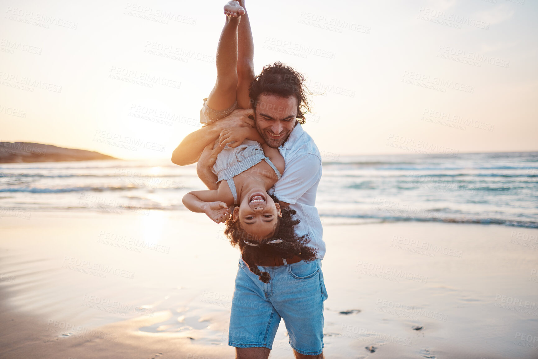Buy stock photo Beach, sunset and father play with girl on holiday, vacation and adventure. Happy family, adoption and child laughing with dad by ocean for bonding, healthy relationship and fun outdoors in summer