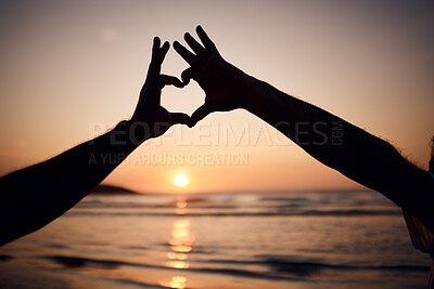 Buy stock photo Beach silhouette, sunset and person with heart hands for nature love, trust and outdoor freedom on ocean vacation. Dark shadow, emoji health icon and tourist with wellness, tropical holiday or travel
