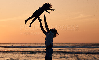 Buy stock photo Child, sunset or father by ocean to play a game in Rio de Janeiro in Brazil with support, care or love. Throw, parent and lifting kid in air at sea to enjoy family bonding together in nature by water