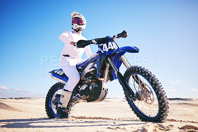 Buy stock photo Sand, motor sports and man drive with motorbike for adrenaline, adventure and freedom in desert. Action, extreme sport and male person on bike on dunes for training, exercise and race or challenge