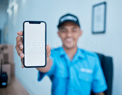 Buy stock photo Security guard man, hand and blank phone screen for mockup space for cctv system promo, smile or automation. Safety officer, surveillance agent and smartphone for app logo, brand or mobile ux design