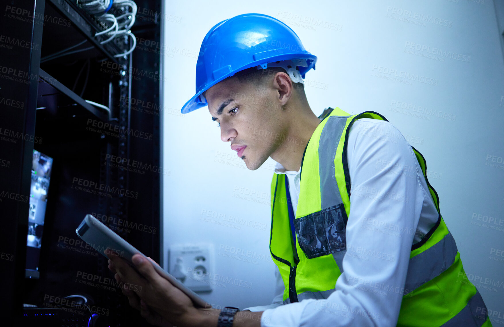 Buy stock photo Man, electrician and tablet for power maintenance, server room or data center upgrade in IT or cybersecurity. Young, engineering person on digital tech for network programming, electricity and cables