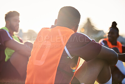 Buy stock photo Group, rugby and men relax on field outdoor, talking and communication at sunrise in the morning. Sports, athlete team and players sitting together after exercise, training or friends workout in game