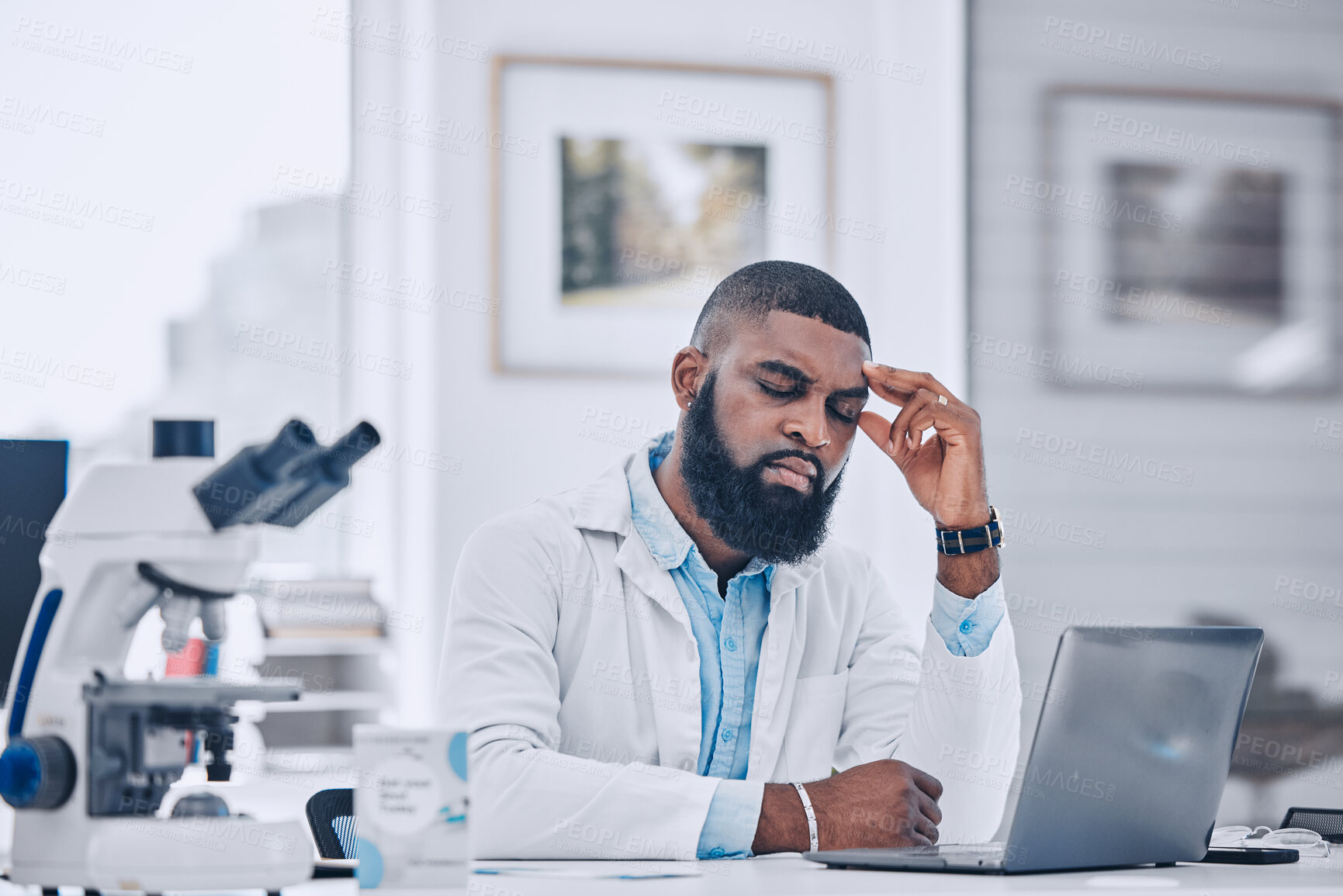 Buy stock photo Headache, stress and man with burnout from science, research mistake or laptop error in laboratory. Tired, sad or frustrated african scientist with migraine pain, anxiety and fatigue of mental health