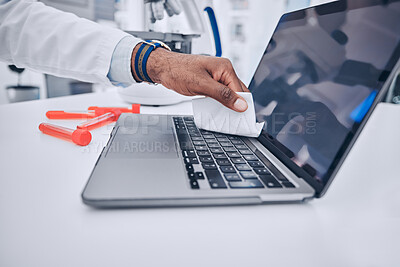 Buy stock photo Man, hands and scientist cleaning laptop in disinfection, bacteria or germ removal in the laboratory. Closeup of male person wiping computer keypad for clean hygiene, sanitizing or health and safety