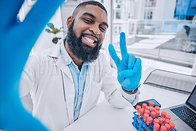 Buy stock photo Scientist, portrait of man and peace for selfie in medical laboratory, research investigation and testing. Face of african science expert smile for profile picture with v sign, emoji and social media