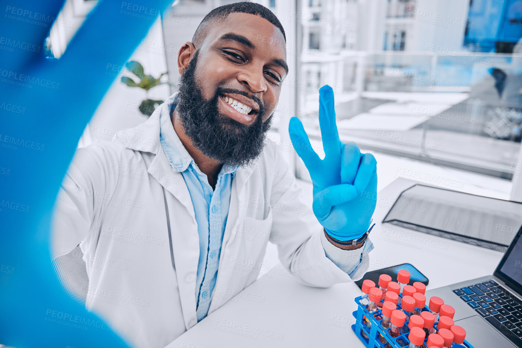 Buy stock photo Scientist, portrait of man and peace for selfie in medical laboratory, research investigation and testing. Face of african science expert smile for profile picture with v sign, emoji and social media