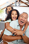 Interracial family, portrait and home with happy, bonding and parent care with grandpa, excited and child. Love, smile and living room with children and support together relax with grandparents 