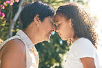 Grandmother, girl and forehead together in garden with eyes closed, connection and bonding with love in summer. Woman, female child and face touch with care, family and relax in sunshine on holiday