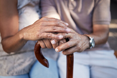 Buy stock photo Senior couple, hands and cane in support, retirement and solidarity in marriage. Walking stick, people with a disability and man and woman in comfort, trust or love, care or empathy in house together