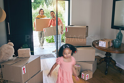 Buy stock photo Gay father, moving and girl child running in new home with motion blur, playing or excited to start life at property. LGBTQ men, kid and cardboard package for real estate, adoption and family house