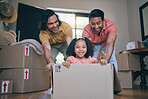 New home, girl and box with parents, push and gay dad with games, portrait and playing on floor with moving. LGBTQ men, female child and cardboard package for car, airplane or driving in family house