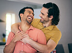 Smile, laughing and gay couple hug, happy and sweet in their home with freedom on the weekend together. LGBT, love and man embrace boyfriend in a living room with care, romance and relationship pride