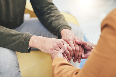 Buy stock photo Mental health, support and patient holding hands with therapist in counseling session for depression, anxiety or trauma. Person, talking and psychologist listening with empathy, trust and helping